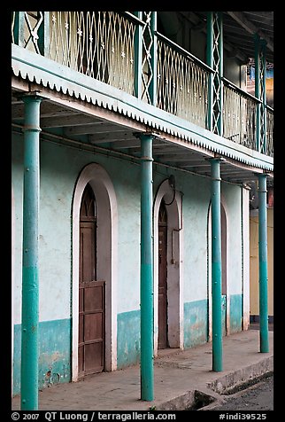 House with balconies painted green, Panjim. Goa, India (color)