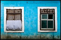 Windows on facade painted blue, Panjim. Goa, India (color)