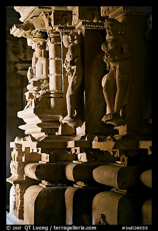 Statues in the corridor (pradakshina), Parsvanatha temple, Eastern Group. Khajuraho, Madhya Pradesh, India