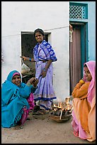 Women cooking outside in village. Khajuraho, Madhya Pradesh, India ( color)