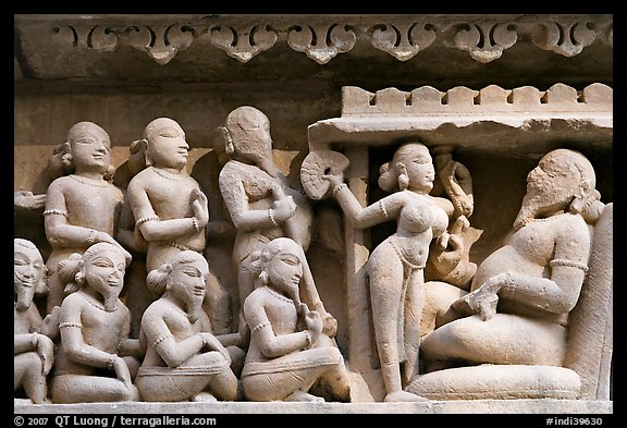 Sculpture of royal court scene, Lakshmana temple. Khajuraho, Madhya Pradesh, India (color)