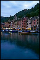 Yachts and fishing boats in Harbor at dusk, Portofino. Liguria, Italy