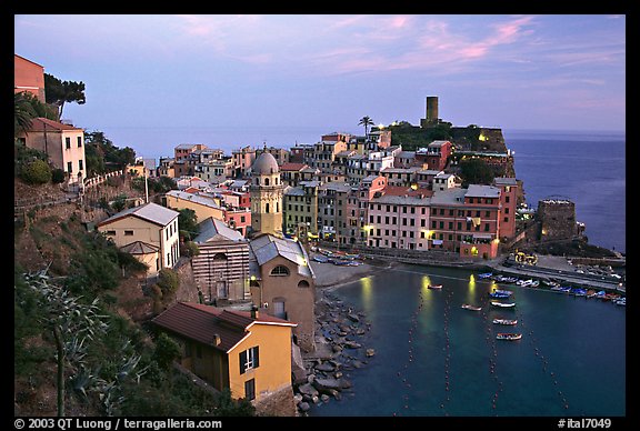 Harbor, church, medieval castle and village, sunset, Vernazza. Cinque Terre, Liguria, Italy (color)