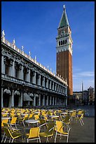 Campanile, Zecca, and empty chairs, Piazza San Marco (Square Saint Mark), early morning. Venice, Veneto, Italy ( color)