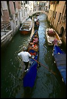 Gondolas lined up in narrow canal. Venice, Veneto, Italy ( color)