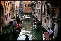 Busy water trafic in  narrow canal. Venice, Veneto, Italy