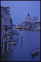 Gondola, Grand Canal, Santa Maria della Salute church from the Academy Bridge, dusk. Venice, Veneto, Italy