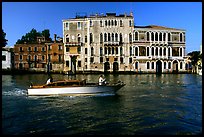 Water taxi passes in front of the Palazzo Dorio on the Grand Canal. Venice, Veneto, Italy ( color)