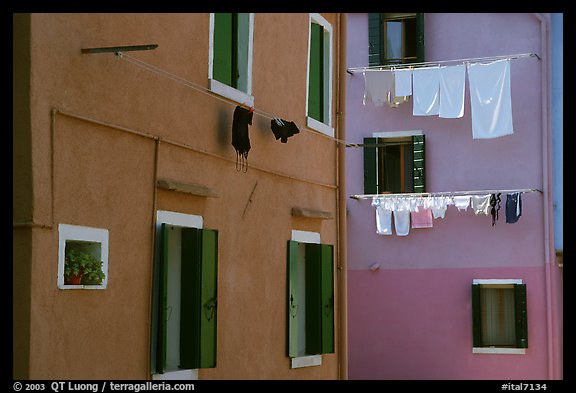 Multicolored houses and hanging laundry, Burano. Venice, Veneto, Italy