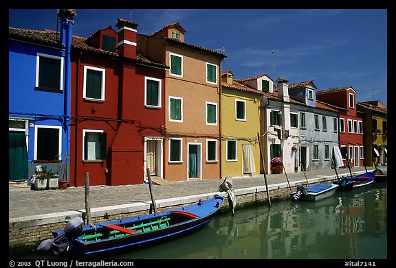 Canal bordered by colorfully painted houses, Burano. Venice, Veneto, Italy (color)