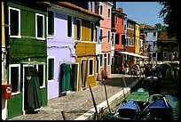 Canal bordered by multicolored  houses, Burano. Venice, Veneto, Italy ( color)
