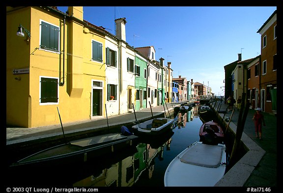 Colorful painted houses along canal, Burano. Venice, Veneto, Italy (color)