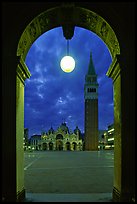 Campanile and Piazza San Marco (Square Saint Mark) seen from arcades at night. Venice, Veneto, Italy ( color)