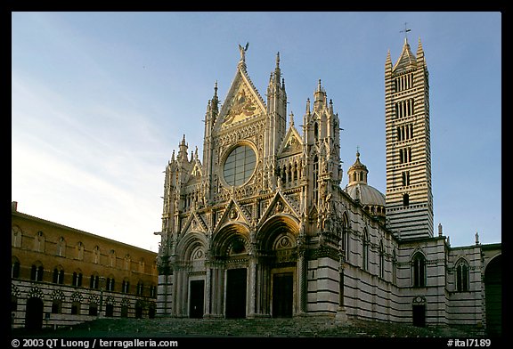 Siena Cathedral (Duomo) with bands of colored marble, late afternoon. Siena, Tuscany, Italy (color)
