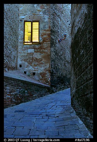 Street and window at dawn. Siena, Tuscany, Italy