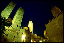 Medieval towers above Piazza del Duomo at night. San Gimignano, Tuscany, Italy ( color)