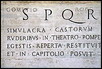 Inscription in Latin with the SPQR letters of the Ancient Roman Empire. Rome, Lazio, Italy (color)