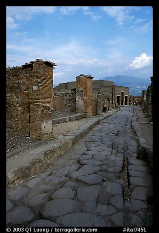 Paved street and ruins. Pompeii, Campania, Italy