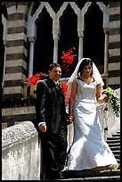 Newly wed couple on the stairs of Duomo Sant'Andrea, Amalfi. Amalfi Coast, Campania, Italy ( color)