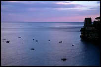 Small boats and tower and sunset, Positano. Amalfi Coast, Campania, Italy ( color)