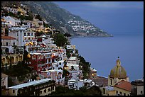 Chiesa di Santa Maria Assunta and houses on steep hills at dusk, Positano. Amalfi Coast, Campania, Italy (color)
