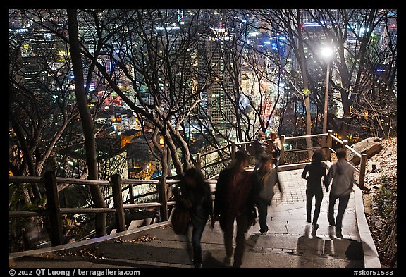 People on Namsan stairs by night. Seoul, South Korea