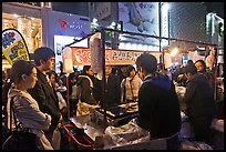 Busy food stall by night. Seoul, South Korea ( color)