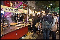People lining up for street food. Seoul, South Korea (color)