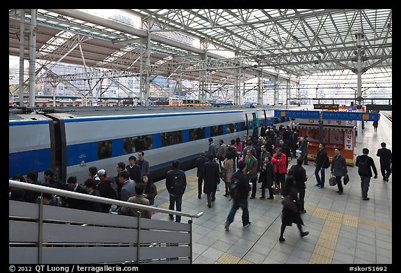 Passengers boarding high speed KTX train. Seoul, South Korea