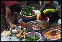 Women preparing kim chee. Gyeongju, South Korea (color)