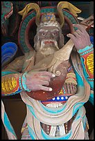 Wooden statue with musical instrument, Bulguk-sa. Gyeongju, South Korea ( color)