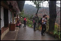 Hikers at Sangseonam hermitage, Samneung Valley, Mt Namsan. Gyeongju, South Korea (color)