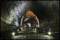 Manjanggul Lava cave with visitor standing. Jeju Island, South Korea (color)