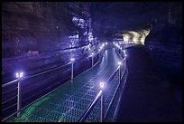 Walkway in Geomunoreum cave with world heritage logos. Jeju Island, South Korea (color)