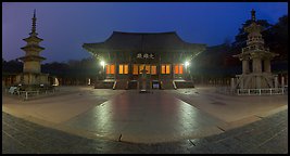 Frontal view of main hall and two pagodas at night, Bulguksa. Gyeongju, South Korea (Panoramic color)