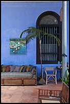 Chairs and blue wall, Cheong Fatt Tze Mansion. George Town, Penang, Malaysia (color)