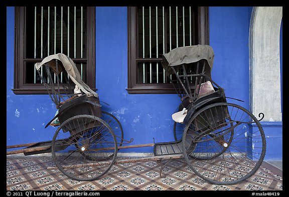 Bicycle rickshaws, Cheong Fatt Tze Mansion. George Town, Penang, Malaysia (color)