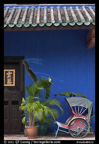 Trishaw, door, and roofing, Cheong Fatt Tze Mansion. George Town, Penang, Malaysia (color)