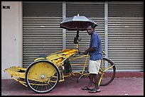 Driver and trishaw. George Town, Penang, Malaysia (color)