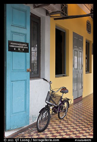 Bicycle in front of office. George Town, Penang, Malaysia (color)