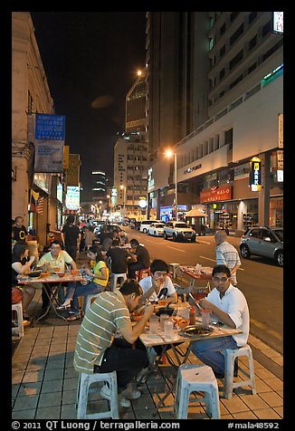 Street restaurant at night, Chinatown. Kuala Lumpur, Malaysia