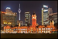KL night skyline with Sultan Abdul Samad Building and Menara KL. Kuala Lumpur, Malaysia (color)