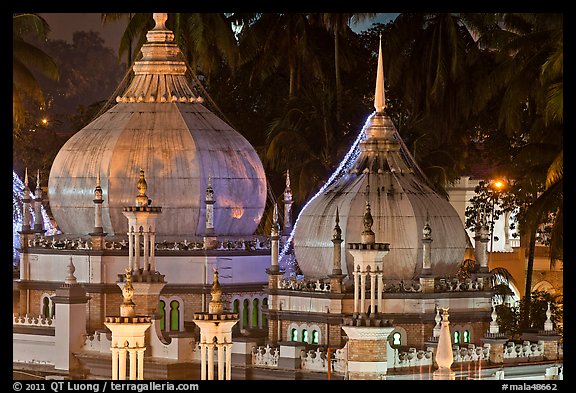Onion domes of Masjid Jamek, night. Kuala Lumpur, Malaysia