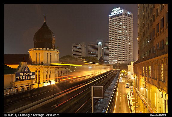 LRT train in motion at night. Kuala Lumpur, Malaysia