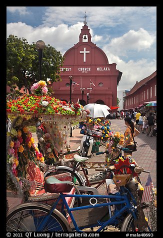 Malacca Town Square with trishaws and church. Malacca City, Malaysia