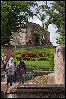 Malay tourists descend stairs from St Paul Hill. Malacca City, Malaysia (color)