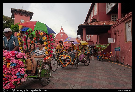 Trishaws leaving Town Square and Stadthuys. Malacca City, Malaysia (color)