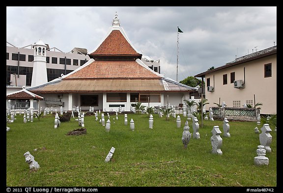 Cemetery, Mosque, and Moorish watchtower minaret. Malacca City, Malaysia (color)