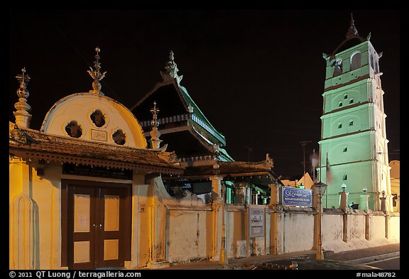 Gate, Mosque, and minaret, Masjid Kampung Hulu at night. Malacca City, Malaysia (color)