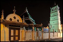 Gate, Mosque, and minaret, Masjid Kampung Hulu at night. Malacca City, Malaysia